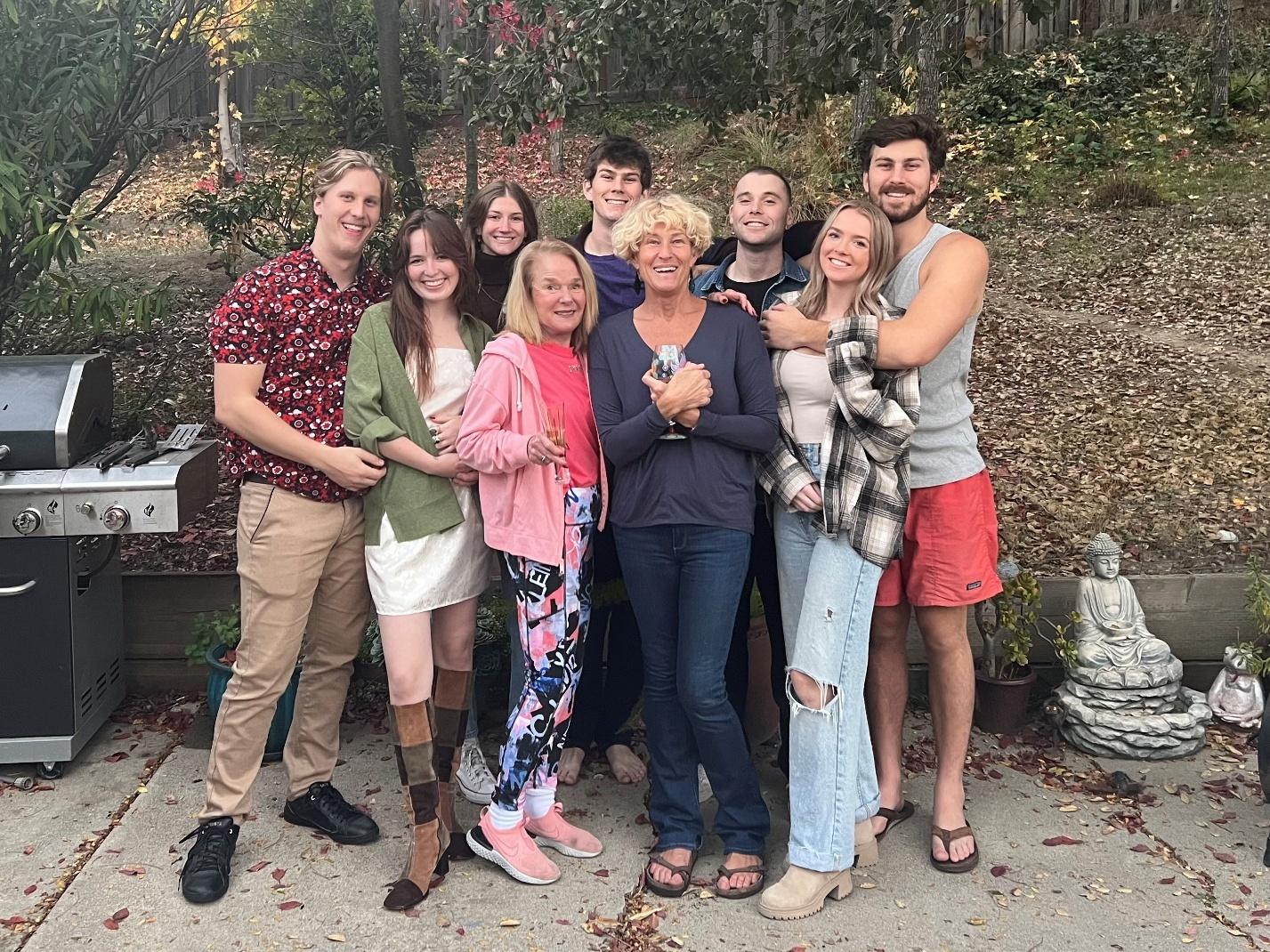 A black-and-white photograph of an older man holding a smiling baby close — representing the family love Laurel documented in her own words.